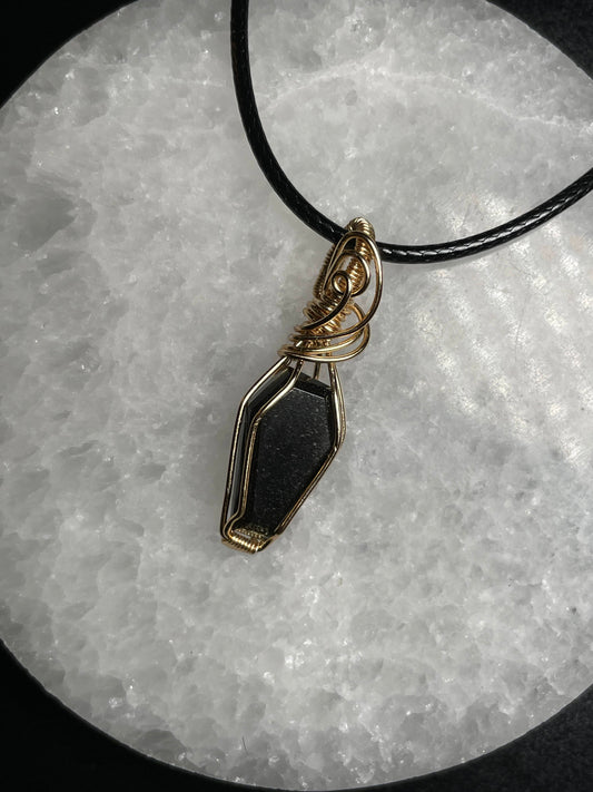 Coffin shaped gold sheen obsidian pendant