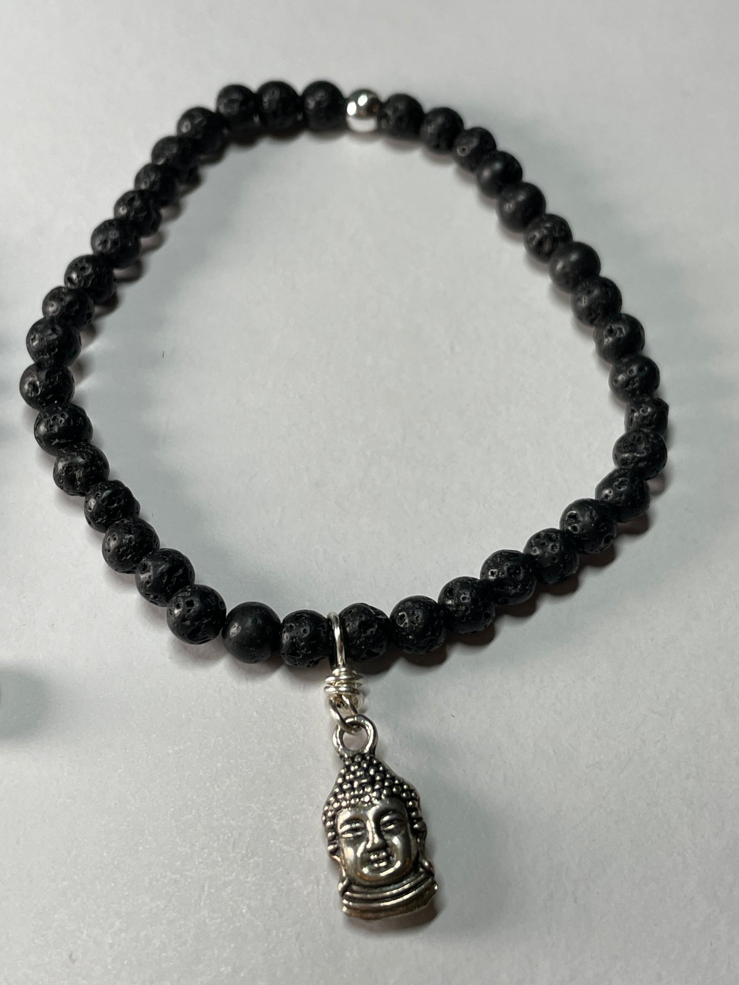 Lava rock bracelet with buddha charm