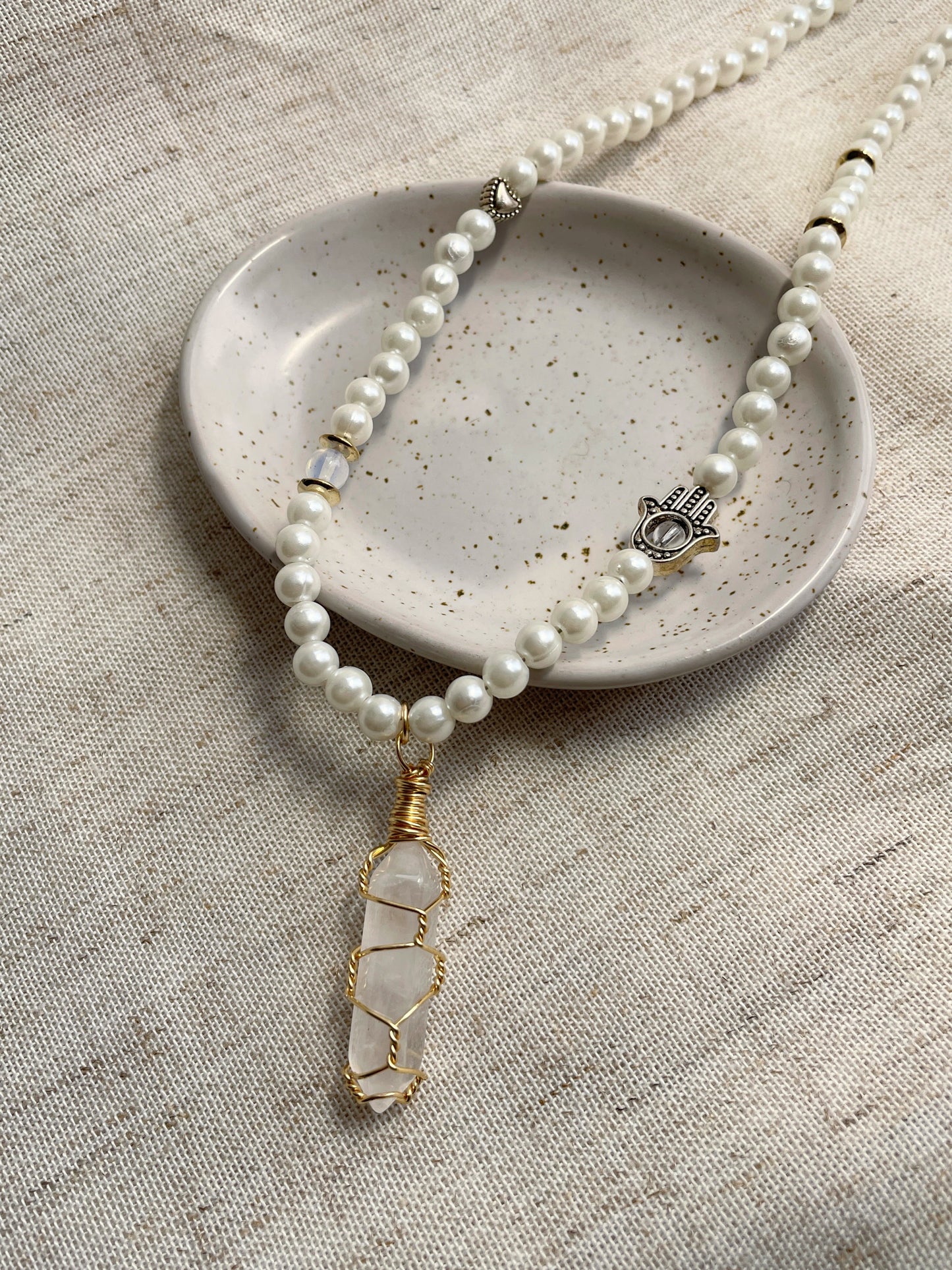 Faux pearl necklace with crystal pendant