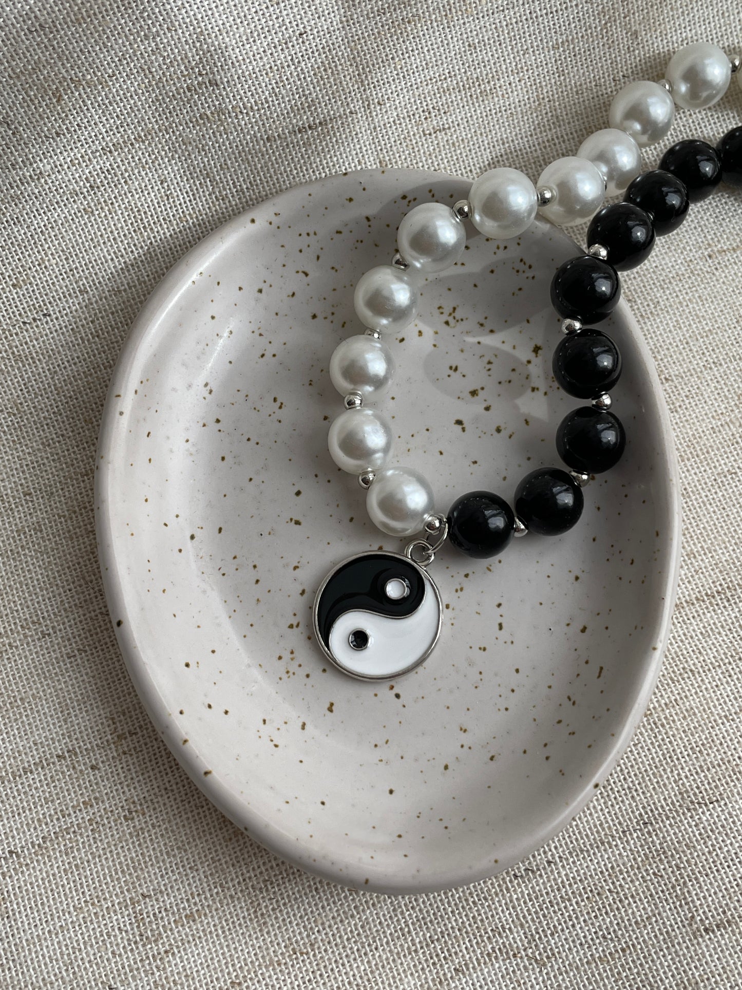 Yin and Yang faux pearl necklace