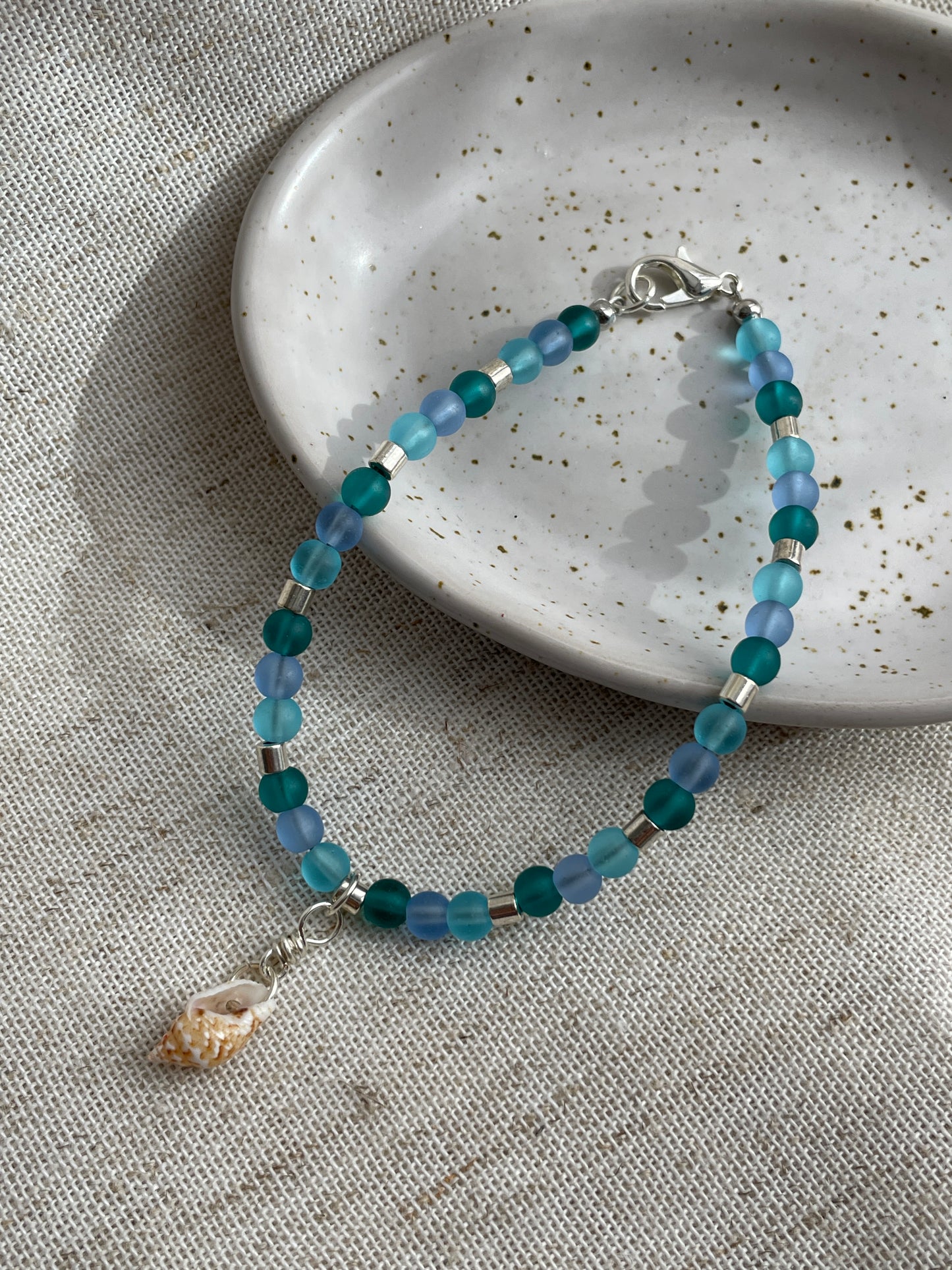 Sea glass bracelet with charms