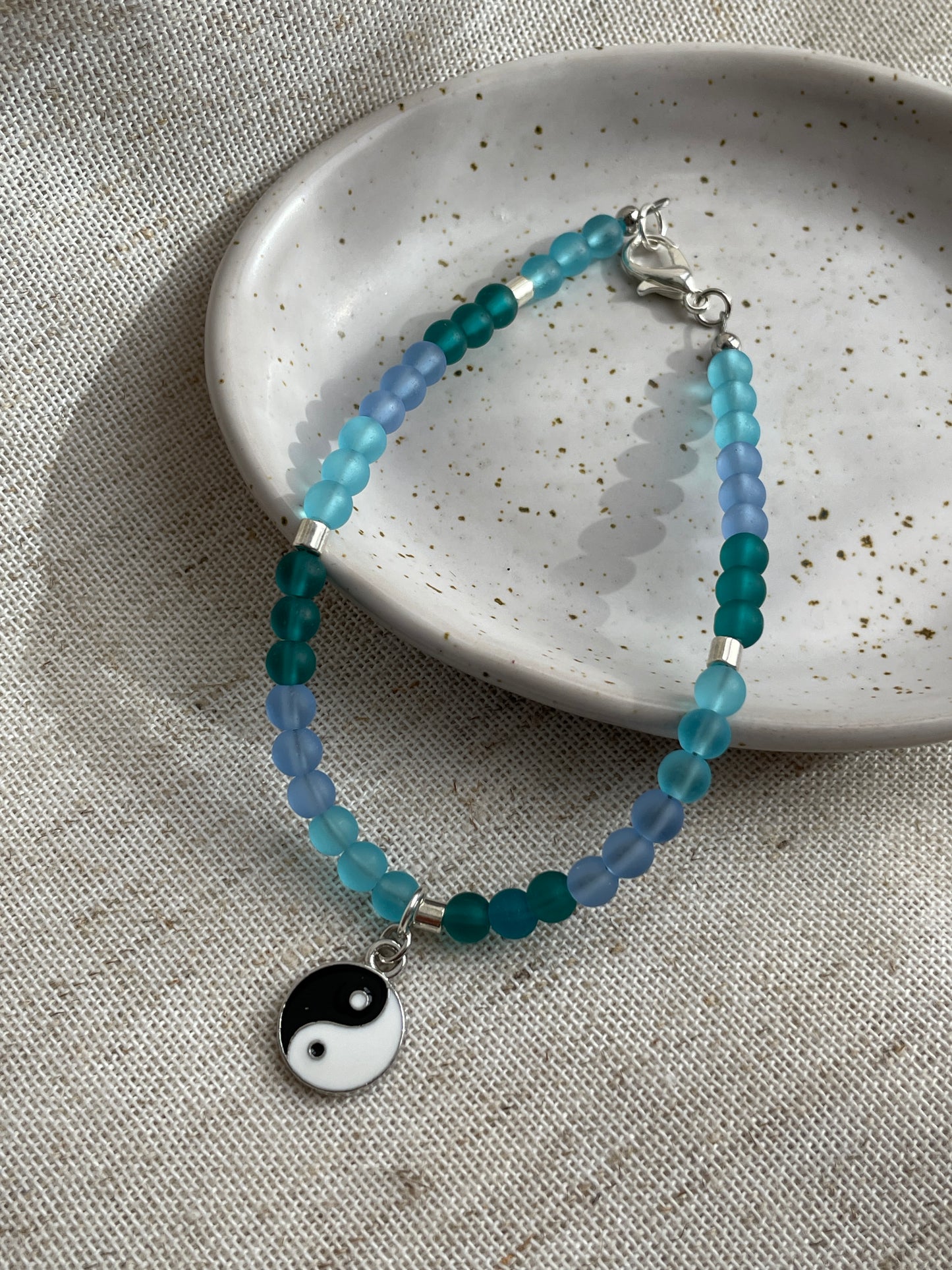 Sea glass bracelet with charms