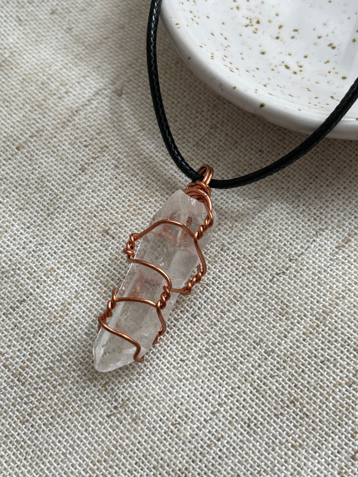 Raw clear quartz pendant