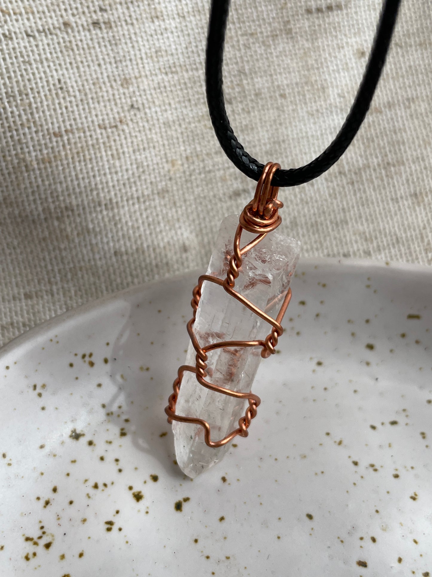 Raw clear quartz pendant