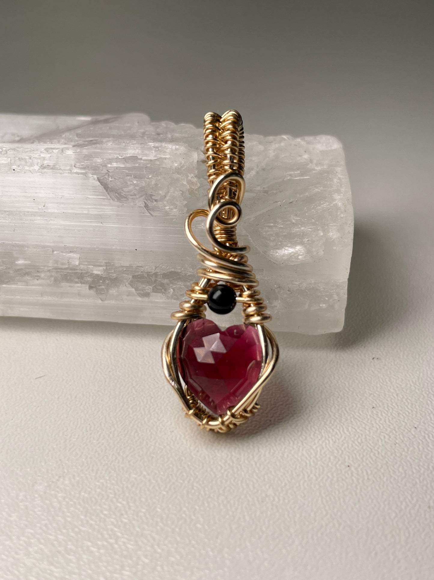 Garnet heart pendants