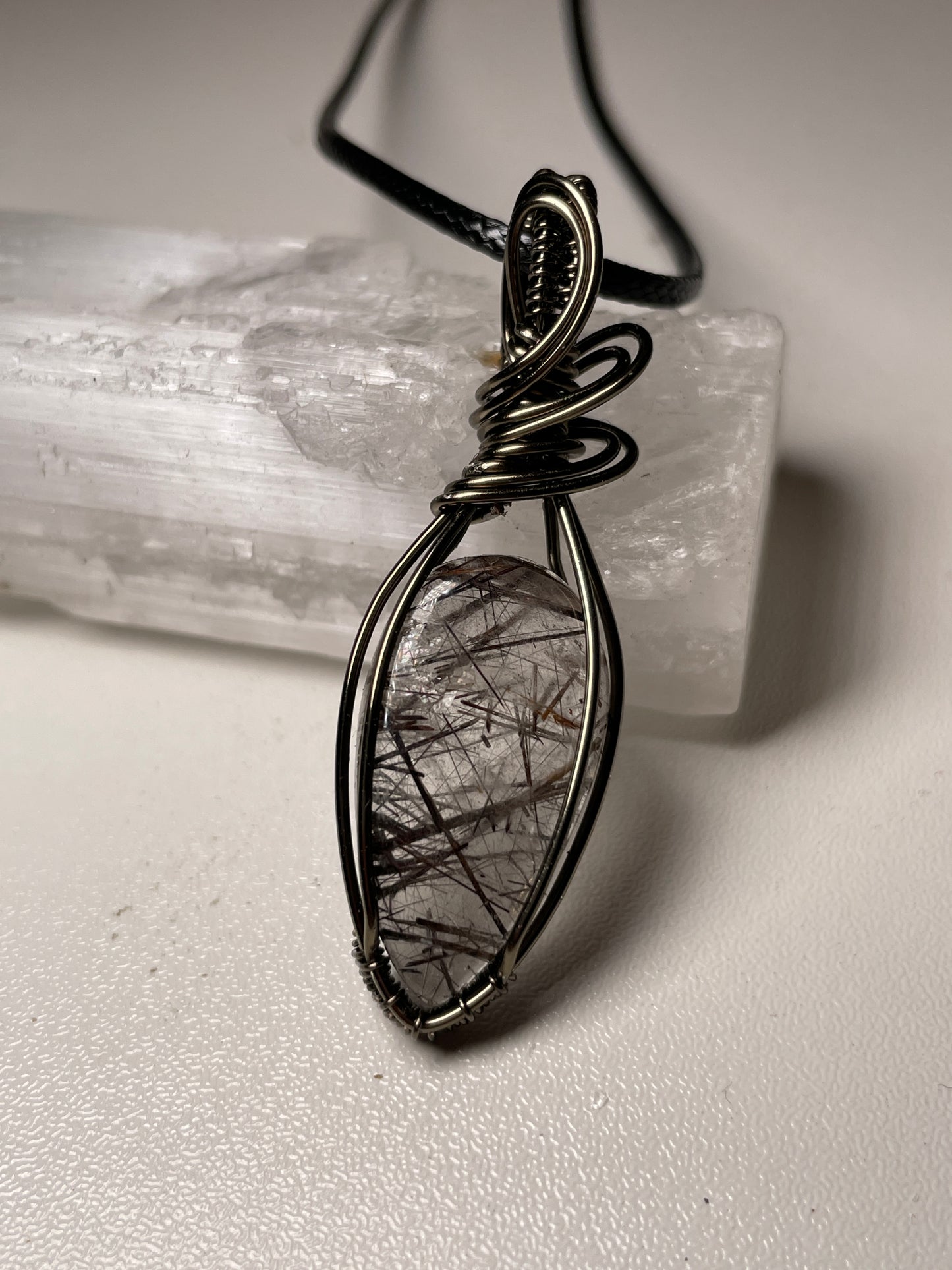 Dark rutile quartz pendant (hematite)