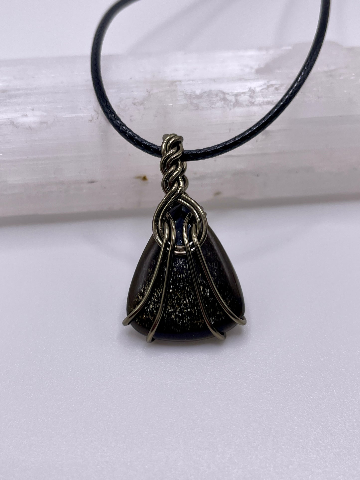 Gold sheen obsidian pendant