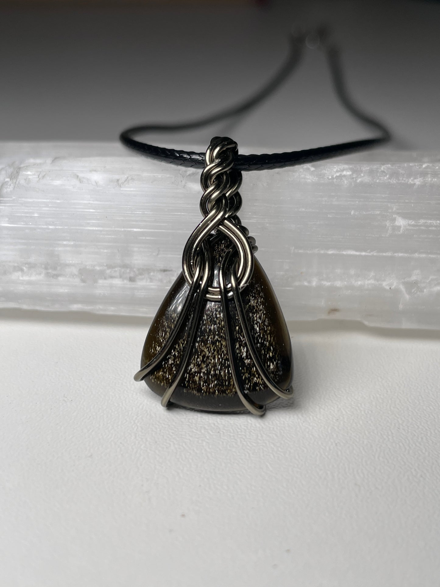 Gold sheen obsidian pendant