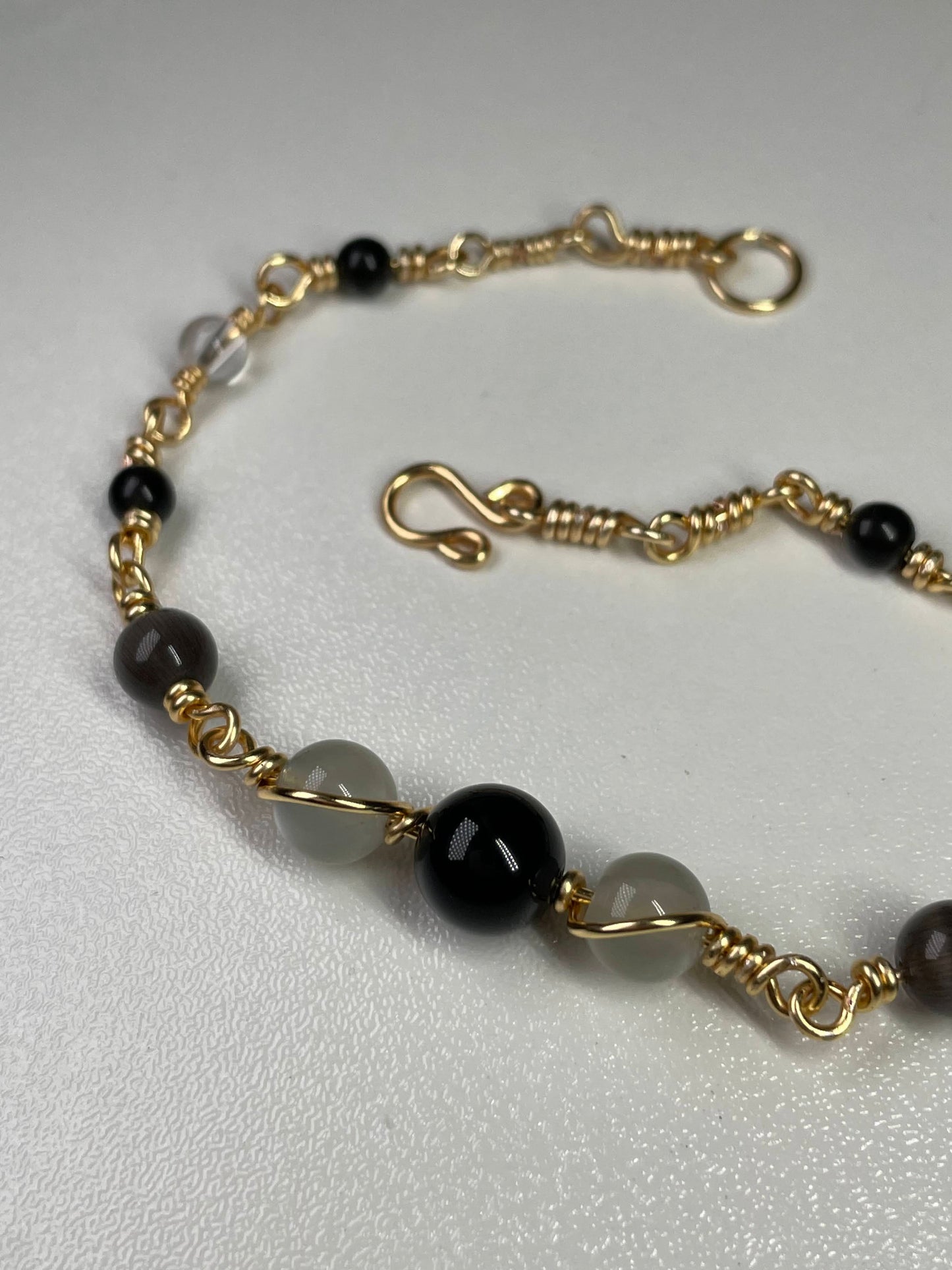 Black obsidian & gray moonstone wire bracelet