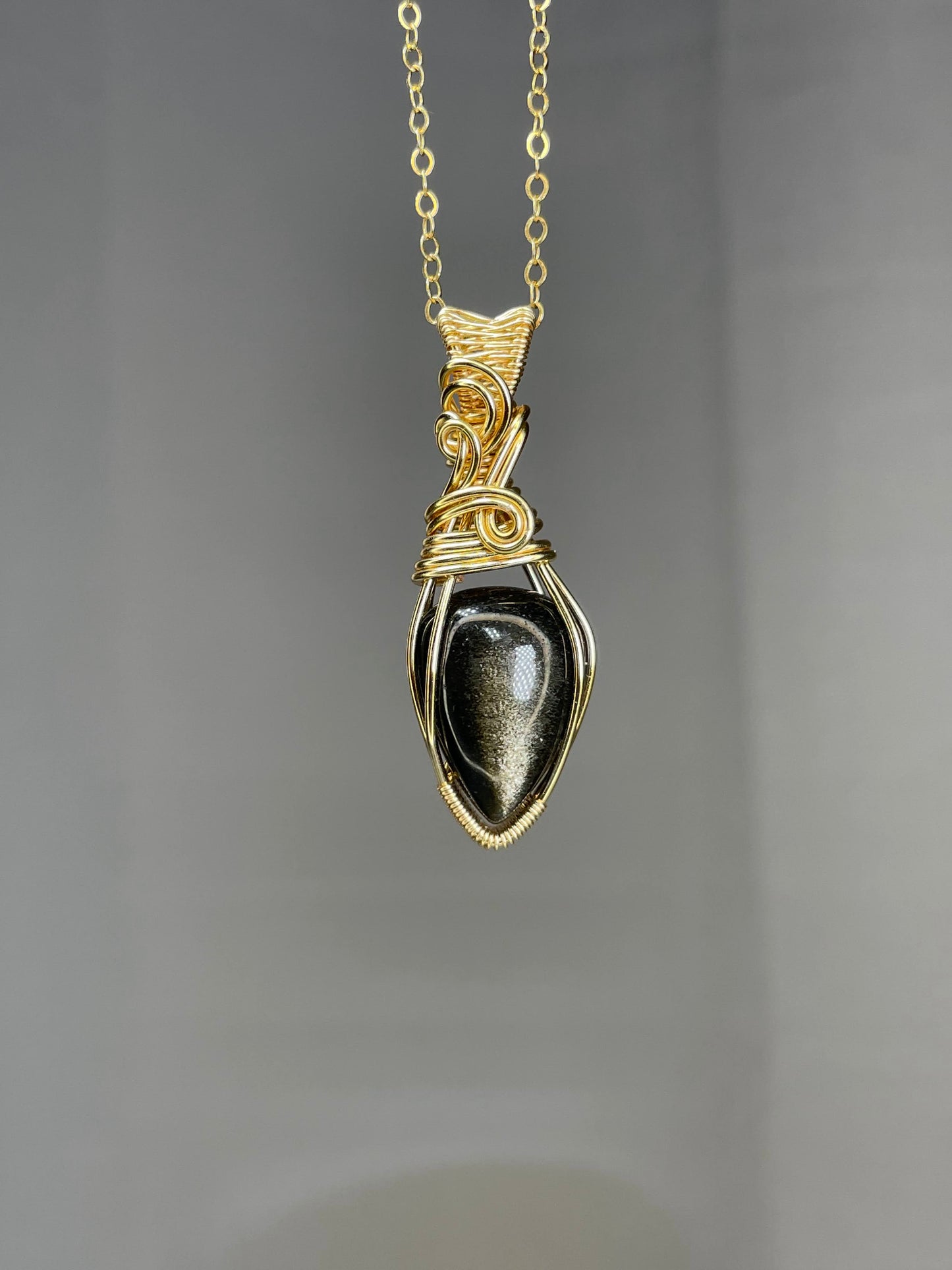 Gold sheen obsidian pendant